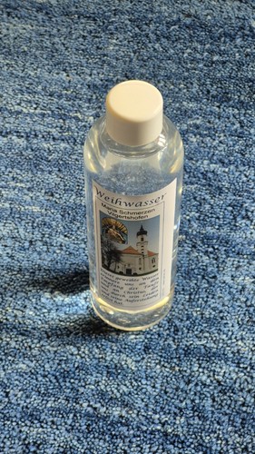 Weihwasser flasche gefüllt - weihwasser,